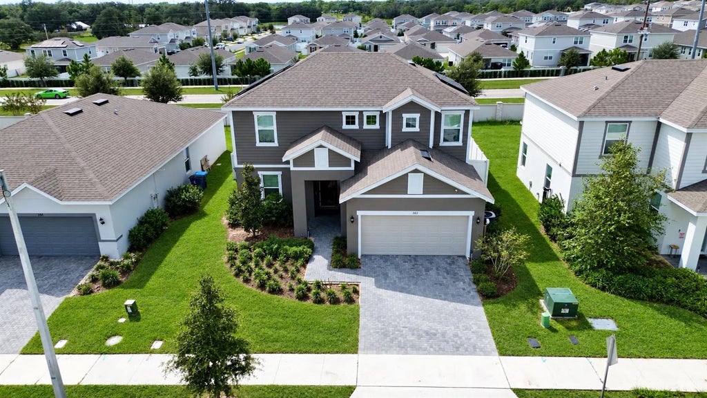 Photo of 263 Bottle Brush Dr, Haines City, FL 33844 (MLS # S5158853)