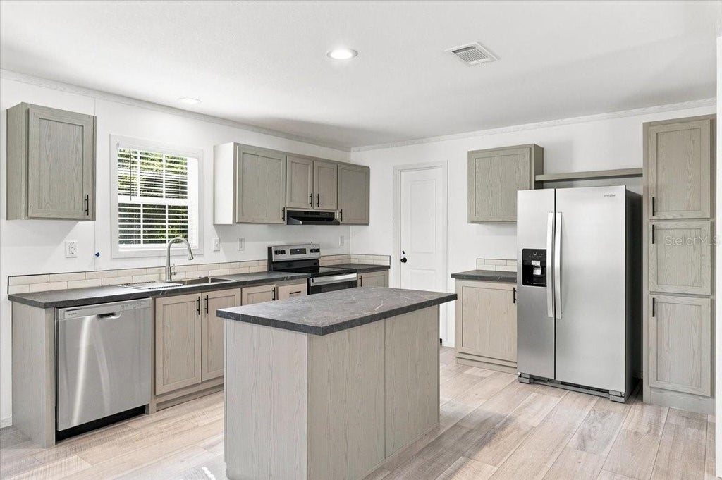 Photo of 39148 Orient Avenue, Zephyrhills, FL 33542 (MLS # P4939742)