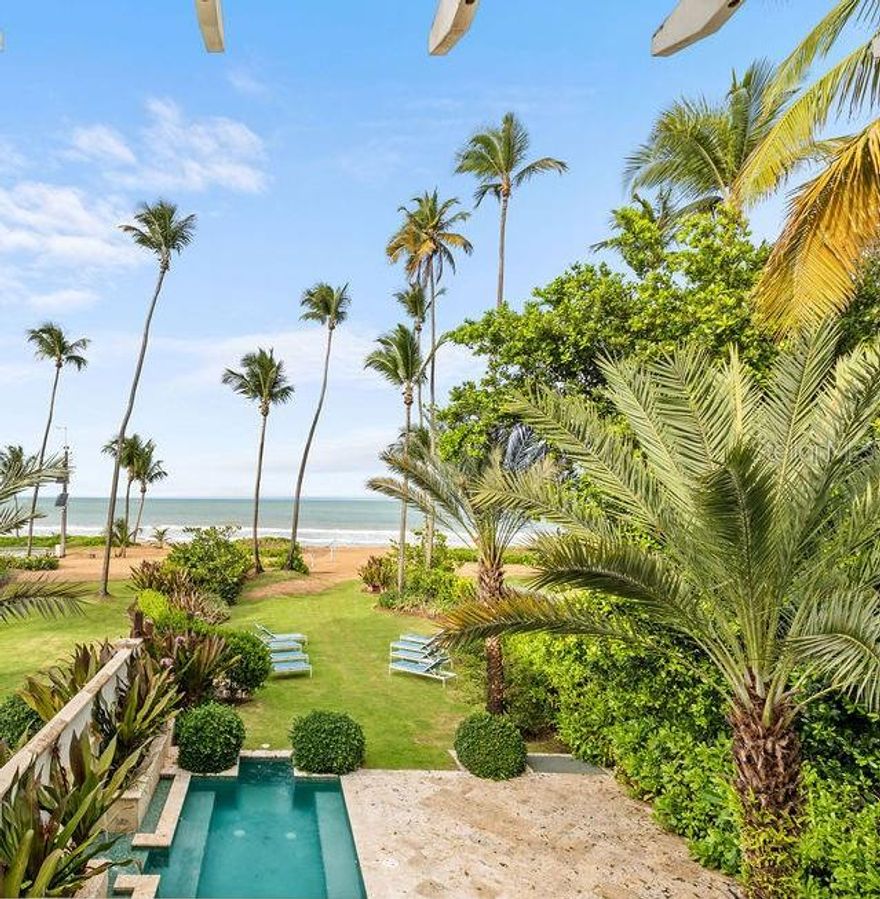Short Sale. Welcome to the award-winning 5-diamond St. Regis Bahia Beach Resort and Golf Club. Peace and serenity await you at this beachside stunner nestled at the base of El Yunque rainforest, where you can enjoy the best of beach living, mountain views and lush rainforest flora. Scattered throughout the resort is arguably the best golf course in Puerto Rico, a Robert Trent Jones Jr. masterpiece, which according to Golf Digest is “like vacationing in a nature preserve.” With unmatched authenticity with respect to its flawless integration into the landscape at the base of the Yunque rainforest, you will be lost among the many native bird species to the resort and the 2 miles of sprawling, raw South Atlantic coastline. 

This beachfront townhome sits on about 3/8ths of an acre of land that leads out to your own piece of Puerto Rico beach heaven.  This is the best priced beachfront residence located anywhere within the prime areas of Puerto Rico, and is just a few steps from the St. Regis beach club, but does not abut it, providing you with the perfect blend of privacy and convenience.  Four luxurious bedrooms make this a prime property for a large and growing family, or you may also take advantage of the white-hot short term rental opportunity that comes with a beachfront residence within one of the Caribbean's finest resorts.  Perfectly appointed, delivered turn-key, and uniquely private, this is your opportunity to live your Puerto Rico dream.