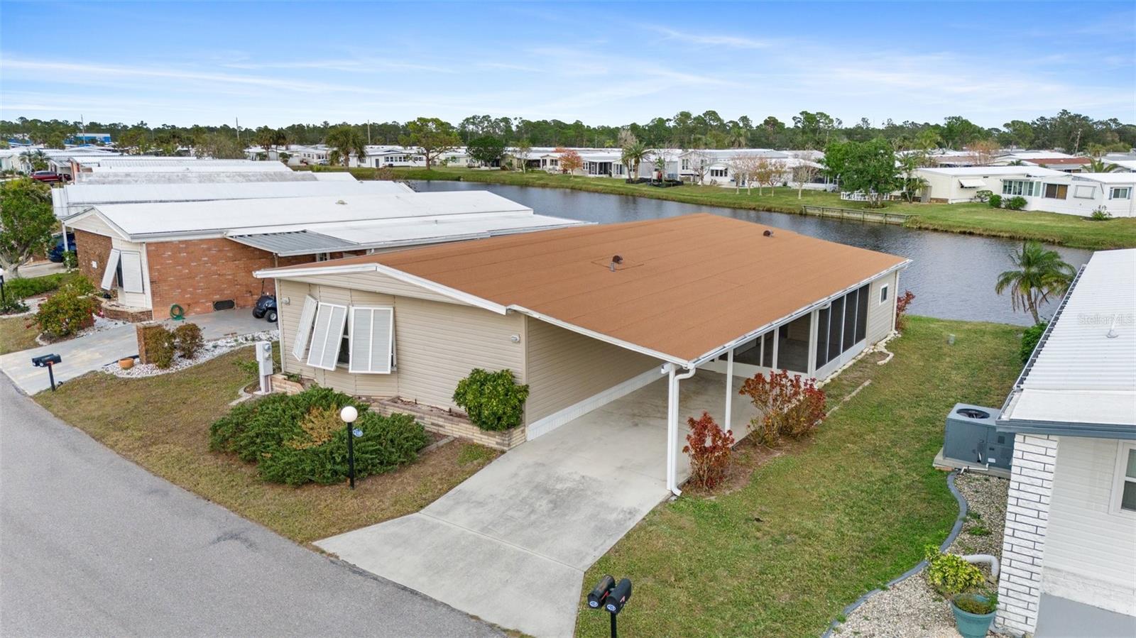 You've just discovered the opportunity of a lifetime! If you've been looking to buy into the best manufactured home park in SW Florida, THIS is the home you've been waiting for. New VINYL SIDING, WINDOWS, and VINYL FLOORING were installed in 2018. The ROOF was replaced in 2023 and included solid shingle material over installed OSB. The SHIP-LAP CEILINGS were added in 2024. BRAND NEW A/C UNIT and THERMOSTAT installed in 2024!! Located on Cayman Lake with an east water view—you won’t want to miss a single sunrise! Welcome to Lazy River Village! One of the premiere 55+ waterfront manufactured park in all of Sarasota and Charlotte counties! The BEST amenities, clubs, and selection of activities you will find in any co-op park in all of Sarasota county and even Charlotte County. Lazy River is located on the banks of the beautiful Myakka River. This 2 bed 2 bath home has had MANY UPGRADES & IMPROVEMENTS made in recent years. A large primary bedroom with an ensuite bathroom features charming bay windows and lots of natural light. An open floor plan makes room for entertaining guests. The kitchen features an adorable nook for casual meals and the bay window looks out over Caymen Lake in the backyard. The living room sliding doors also look out over the water view, bringing the serenity of nature indoors. Ship-lap paneling on the ceilings creates a warm “beachy” vibe and elevates the look of the entire interior!
This home has been well-managed and well-cared-for over the years, with multiple upgrades and replacements. The owners have taken very good care of this home, and now it’s your turn to put your special touch on it!
If you enjoy an abundance of activities, you will have plenty to choose from in Lazy River Village: Pickleball, tennis, bike clubs, card clubs, and pontoon boating. They even have a professional woodworking shop. A low monthly fee of $276 includes all the amenities. There are other amenities for an extra fee, such as a marina slip if your home is not located on the water.
One of the things that makes Lazy River Village so great is its proximity to...well...everything! Be prepared to enjoy Florida's wildlife at its finest, both inside the Lazy River Village complex and at abundant state parks and nature preserves. Shopping and dining surround you in all directions. The spring training homes of both the Atlanta Braves & the Tampa Bay Rays are just a minutes away. The world-renowned Gulf of Mexico beaches are all within 30 minutes or less! 1) Englewood beach, 2) Casperson Beach (GREAT for shelling), 3) Venice Beach (shark tooth capital of the world), 4) Brohard Paw Park, 5) Nokomis beach (you've GOT to experience the weekly drum circles), 6) the island gem of southwest Florida: Boca Grande... And finally: 7) Siesta Key in Sarasota has been ranked multiple times as the number one beach in the nation and is a mere 35 minutes away. Lazy River Village offers a lifestyle that every retiree dreams of. You have the quaint downtowns of Venice and Punta Gorda--both cities are often ranked as Top 10 destinations in the country for retirement. Another local favorite, Englewood, is a cozy, fun beach town on the Gulf of Mexico.