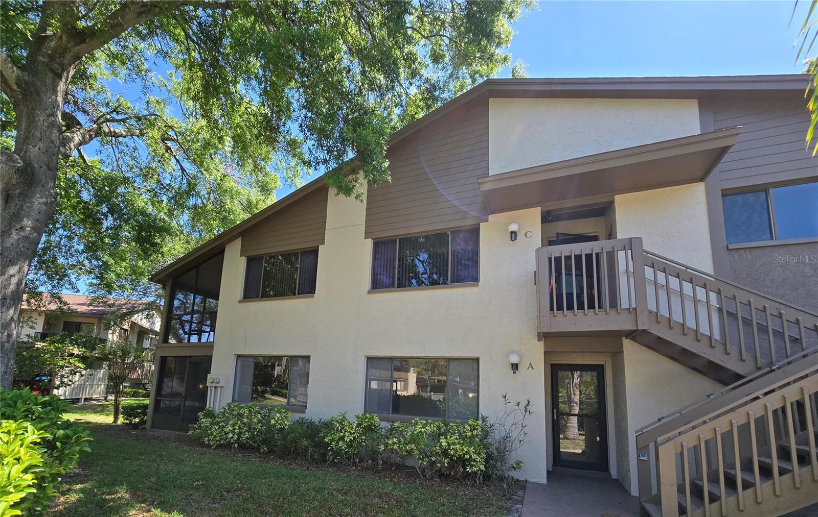 Back On The Market.......Come take a look at this well maintained 2 bedroom 2 bath condo located on the first floor (YES NO STAIRS) in this sought after 55 plus community of BEACON WOODS. Recent upgrades include new vinyl plank flooring in the living areas, adding a touch of modern elegance to the space, and the entire unit has been freshly painted, so it is move in ready. The split bedroom plan allows privacy to all, with the primary bedroom and its own private bathroom on one side of the home, while the secondary bedroom and guest bath are located just off the dining room. Through the sliding doors off the living room, sit back and relax, with a cup of coffee or that 5 o'clock cocktail, on the enclosed sun room. Spend time meeting your neighbors at the community amenities including the recreational clubhouse, heated pool, hot tub, fitness center, parks and more. So many activities - Retirement Living at its BEST!!!!!