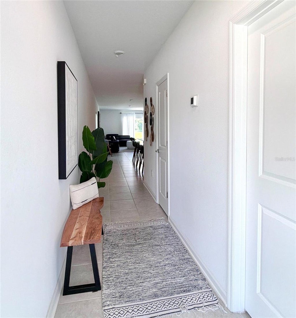 Photo of 122 Tiny Flower Road, Davenport, FL 33837 (MLS # O6440136)