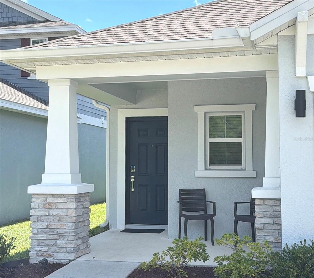 Photo of 122 Tiny Flower Road, Davenport, FL 33837 (MLS # O6440136)