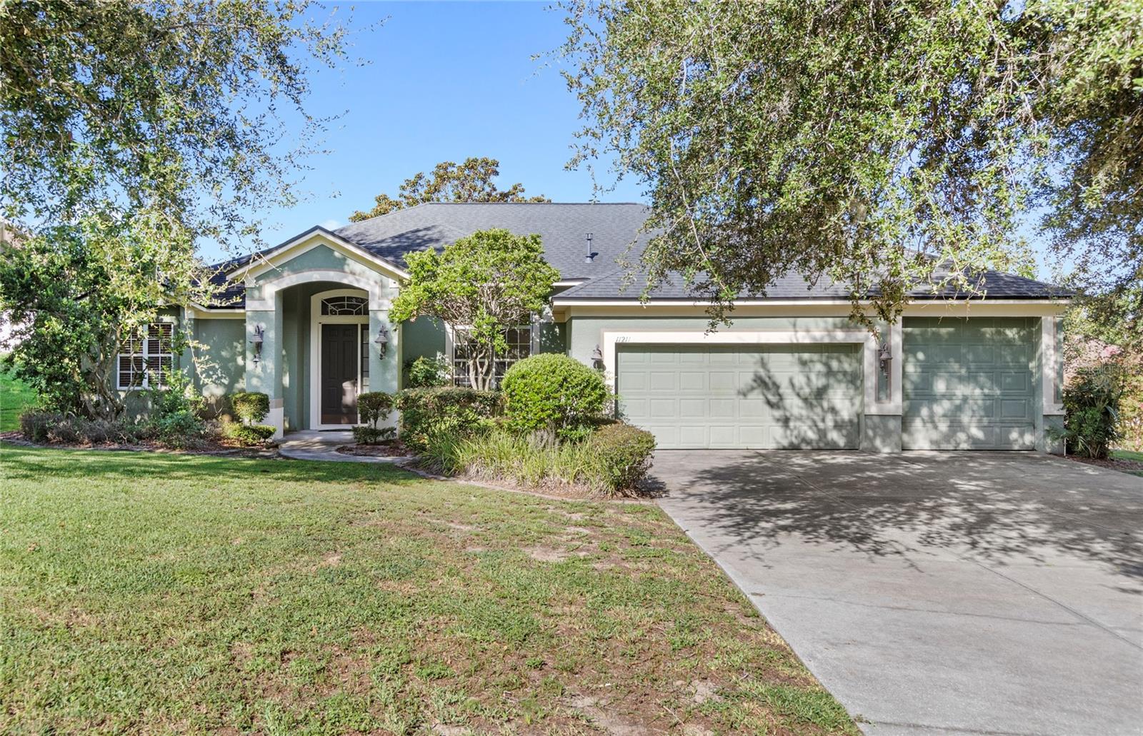 LAKE VIEW POOL HOME on an elevated large corner lot in Clermont's well-established Crescent Bay Community! This home features 3 bedrooms, 2 bathrooms, and over 2,000 square feet of living space. Enjoy private lake access to the CLERMONT CHAIN OF LAKES with a neighborhood boat ramp just one street over. This home has an elongated driveway with a 2 car garage PLUS a bonus 3rd space for your boat/RV. The spacious primary suite which takes up the whole left side of the home-includes dual closets, his-and-her vanities, a tub/shower duo, and bonus office space with direct pool access. The neighborhood is quiet, scenic, and offers a low monthly HOA. This home is just 15 minutes to Historic Downtown Clermont, and only 30–35 minutes to Downtown Winter Garden and Disney. Experience the best of the Clermont lifestyle—schedule your showing today!