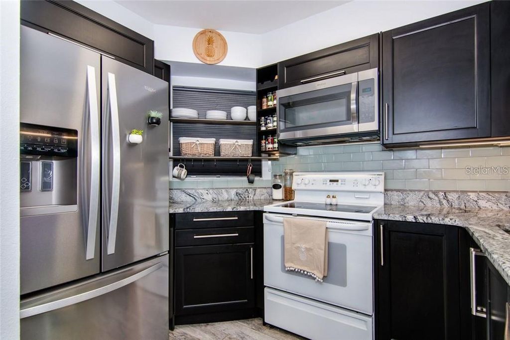 Photo of 6932 Stones Throw Circle N #7101, St Petersburg, FL 33710 (MLS # TB8400837)