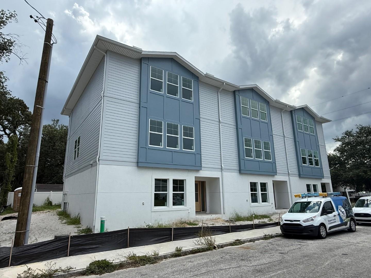 Under Construction. Under Construction. Located in the vibrant neighborhood of North Hyde Park, these Modern Townhomes are perfect for the urban city buyer in search of modern luxury. No flood insurance required. Built by Momentum Homes, a South Tampa local builder known for their quality homes. Modern design with Open-Concept living. Spacious open floor plan with a seamless flow. 1st Floor En-suite! 2 nd level; Chef's kitchen features: large center island with built-in storage, quartz countertops, custom cabinetry, closet pantry & SS appliances. Stylish & functional features. Beautiful light oak engineered flooring throughout. Oversized windows for abundant natural light. Hardwood staircase with white risers for a classic touch. 3rd level: 2 secondary bedrooms, with a shared hallway bath with dual vanities. Next the Owner's retreat- A grand primary suite, large enough for a King size bed & all your furniture. A walk-in closet, & primary bathroom with dual vanities & large shower. Additional features: High ceilings throughout & of course high impact windows for peace of mind. 5.1 Surround sound prewire in great room. 2- A/C Units. Security system 1 keypad door/ window contacts first floor only. St. Augustine sod, white vinyl fencing. Comes with a 2-10 builder's home warranty. Close to Armatureworks, Riverwalk, Downtown, New Publix, Hyde Park Village, Bayshore Blvd, Rome & Fig, Willa's, Psomi, Sukha Club, Cousin Vinnys, & Santoro's Pizza.