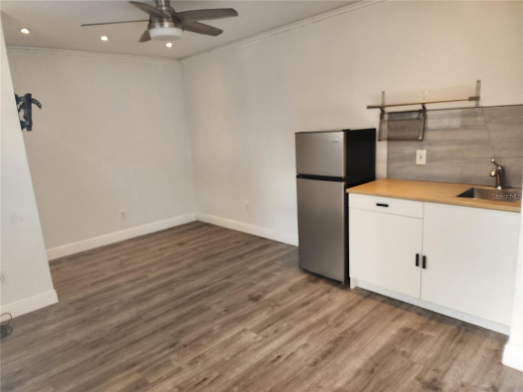 Photo of 2413 Calloway Drive, Orlando, FL 32810 (MLS # O6452580)