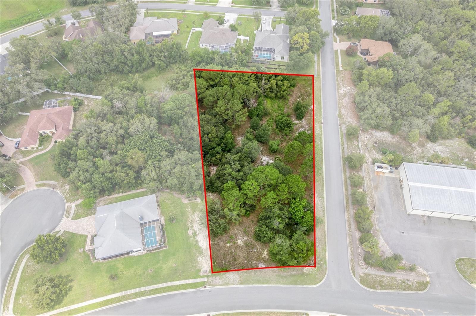 One of the LARGEST lots currently available in the sought after Autumn Oaks community. This impressive 1.34 acre corner lot offers endless possibilities, whether you're looking to build your dream home or hold onto a premium piece of land as an investment, this is the one you've been waiting for. Situated on a quiet street in one of Hudson's most desirable neighborhoods, this spacious lot provides plenty of room for a custom home, pool, and more, all while maintaining privacy and room to breathe. With very few oversized lots like this ever hitting the market, opportunities like this are rare. Autumn Oaks is a community known for its beautiful homes, winding roads, and natural surroundings all with convenient access to shopping, restaurants, and the Suncoast Parkway for easy commuting. Don't miss your chance to own a piece of Autumn Oaks schedule a walk of the property today!