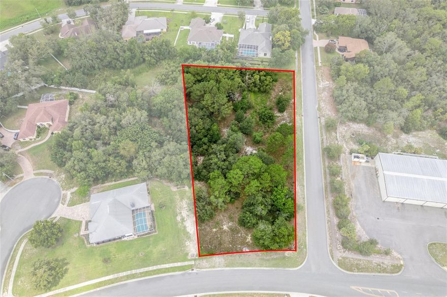 One of the LARGEST lots currently available in the sought after Autumn Oaks community. This impressive 1.34 acre corner lot offers endless possibilities, whether you're looking to build your dream home or hold onto a premium piece of land as an investment, this is the one you've been waiting for. Situated on a quiet street in one of Hudson's most desirable neighborhoods, this spacious lot provides plenty of room for a custom home, pool, and more, all while maintaining privacy and room to breathe. With very few oversized lots like this ever hitting the market, opportunities like this are rare. Autumn Oaks is a community known for its beautiful homes, winding roads, and natural surroundings all with convenient access to shopping, restaurants, and the Suncoast Parkway for easy commuting. Don't miss your chance to own a piece of Autumn Oaks schedule a walk of the property today! (Rear Portion of property has flood zone A)