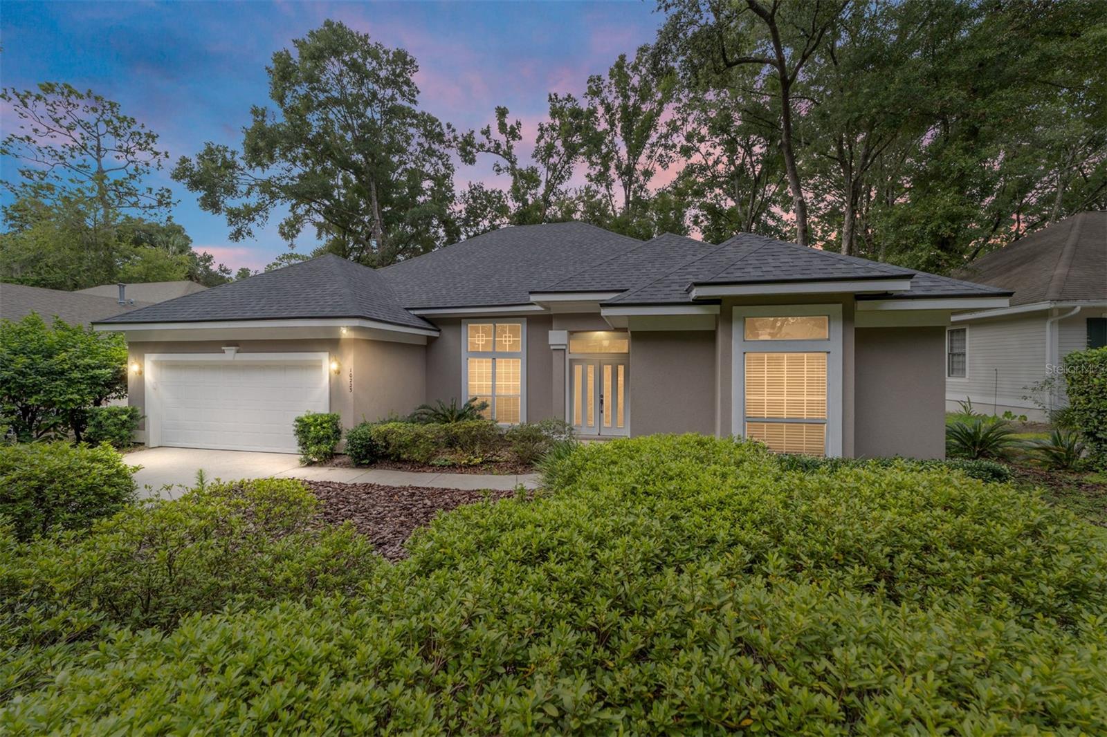 Live the Haile lifestyle—trails, village center, and Hawkstone Golf Course just outside your back door. This 4-bedroom, 3-bath home offers golf course views and an inviting, open floor plan. Inside, you’ll find brand-new carpet, a spacious great room with custom built-ins and fireplace, plus a kitchen with stainless steel appliances.
The three-way split bedroom layout includes a private en suite (or "in-law" suite) with direct access to the expansive screened lanai, perfect for relaxing or entertaining, or hosting visitors. Recent updates provide peace of mind with a 2023 repipe and a brand-new roof in 2024.
Set on one of Haile Plantation’s most picturesque and private streets, this home combines comfort, updates, and a picture-perfect location.
Haile Plantation is one of Gainesville’s most sought-after communities, offering tree-lined streets, miles of walking trails, playgrounds, and a vibrant village center with shopping, restaurants, and a weekly farmers market. Hawkstone Golf and Country Club is just around the corner, providing golf, tennis, pickleball, pools, fitness facilities, and more.
This home is the perfect blend of comfort, style, and convenience in a truly picturesque setting. Video Tour: https://youtu.be/_gFliQr5A-U?si=PXnhp9eyAF5Oqt_O