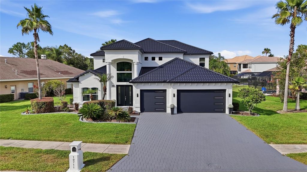 Photo of 10711 Cory Lake Drive, Tampa, FL 33647 (MLS # TB8525437)