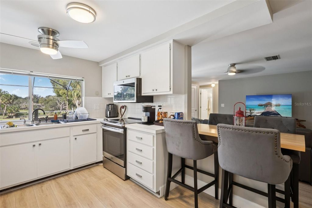 Photo of 8301 Valley Stream Lane, Hudson, FL 34667 (MLS # TB8458448)