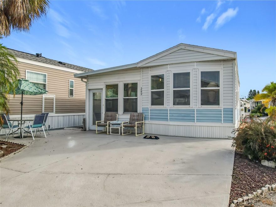 Great curb appeal to this one bedroom, 1 bath home in the highly sought after 55+, guard gated community of Outdoor Resorts! NO LOT RENT - YOU OWN THE LAND!! . The home sits on a spacious corner lot, nicely landscaped, good parking, great curb appeal and across from one of the community bath houses. The home benefits from a NEW ROOF 2023!! and NEW A/C 2025!! and is being sold fully furnished and equipped as seen. Come and experience the fantastic lifestyle that this unique community offers. Amenities include 2 heated swimming pools; private access to a 179 acre lake (Lake Davenport); 9 hole golf course; tennis; pickleball; shuffle board; 9 hole putt-putt golf; 8 bath houses scattered throughout the community; laundry facilities; beautiful 2 story clubhouse offering an endless array of entertainment throughout the year. All of this for the low Association Fee of $768 per quarter which also includes Cable TV, Lawn Mowing, Sewer, Trash and Water. UNBELIEVABLE VALUE FOR MONEY - you won't find a more AFFORDABLE LIFESTYLE !!!! Please remember 55+, no VA or FHA financing, 1 pet rule. The park benefits from close proximity to Disney, medical facilities, restaurants & grocery stores. Don't delay!! Put this home on your 'must see list' and ask to arrange a viewing today.