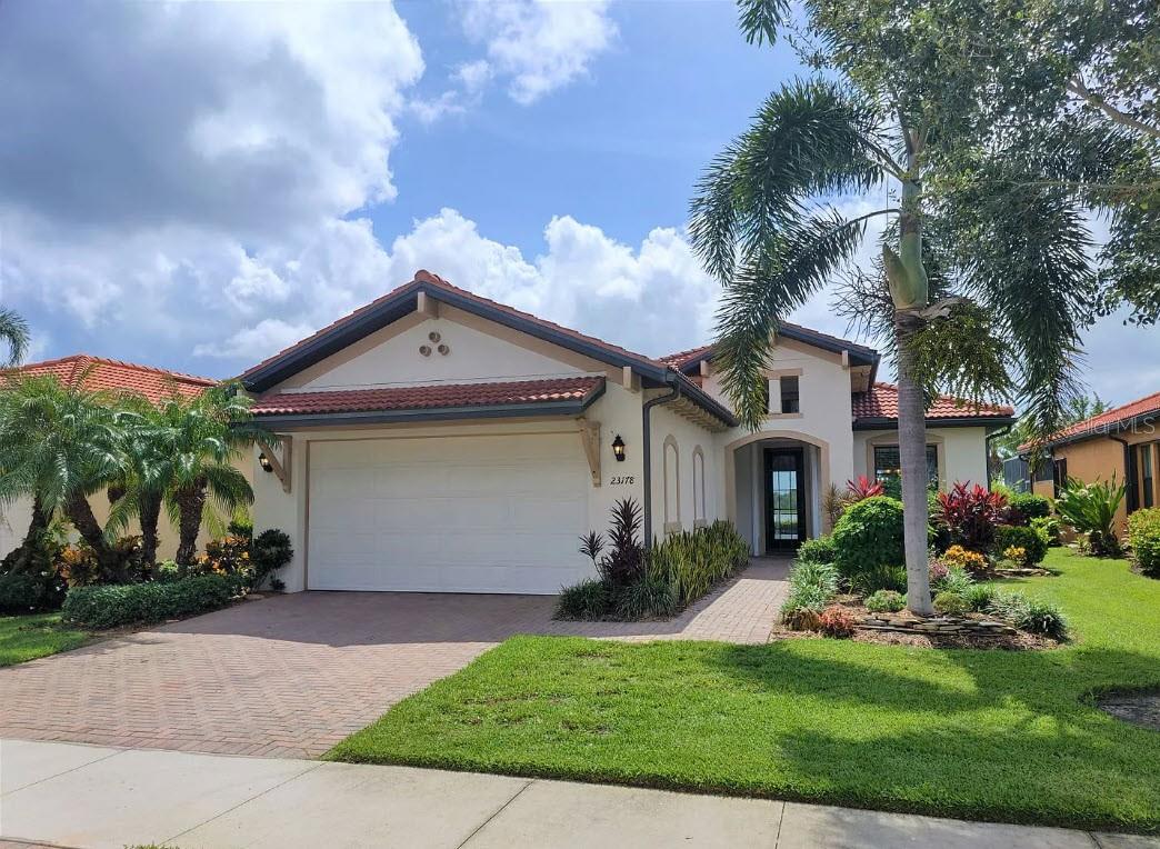 Experience resort-style living in this beautiful, unfurnished single-family home located in the exclusive, gated community of Sarasota National. Nestled within a vast 1,300-acre preserve featuring scenic ponds, lakes, open spaces, and wooded areas, this home offers the perfect setting to enjoy Florida’s natural beauty and abundant wildlife. Spend your days relaxing at the community's luxurious amenities, including a resort-style pool, spa, poolside bar, and on-site lunch restaurant. Stay active with access to a state-of-the-art fitness center, tennis courts, pickleball, bocce, and a golf course (pay-to-play with club restrictions). The clubhouse also offers a library, work room, and more. Lawn care is included for added convenience.
Situated on a premium lot, the home boasts a stunning view of a large lake and preserve, best enjoyed from the comfort of the screened lanai—perfect for morning coffee or evening refreshments. Inside, the open floor plan is highlighted by elegant crown molding and tray ceilings, adding a touch of custom design. The kitchen is a chef’s dream, featuring wood cabinetry, quartz countertops, stainless steel appliances, and a spacious island with breakfast bar seating.
The split-bedroom layout ensures privacy, with the primary suite offering two walk-in closets and a spa-like en-suite bathroom complete with dual vanities, a soaking tub, and a glass-enclosed shower. Two additional bedrooms share a second full bathroom with a shower. A full-sized washer and dryer and a two-car garage with built-in storage shelves provide everyday convenience.
The HOA requires a $500 application fee and approval. The owner will consider one small dog with an additional $35 monthly pet rent. Make Sarasota National your next home and enjoy the best of resort living every day.