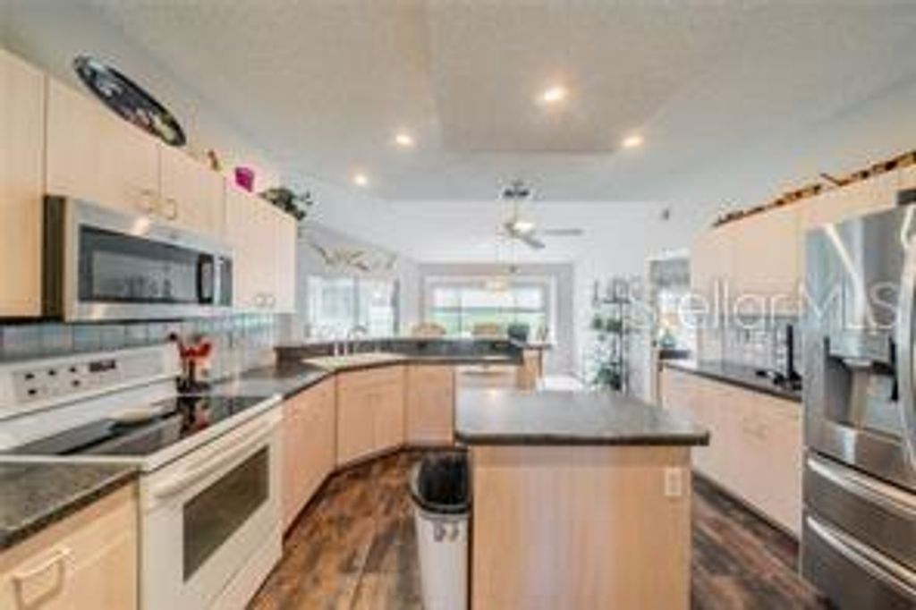 Photo of 739 Winterbrooke Way, Sun City Center, FL 33573 (MLS # TB8434157)