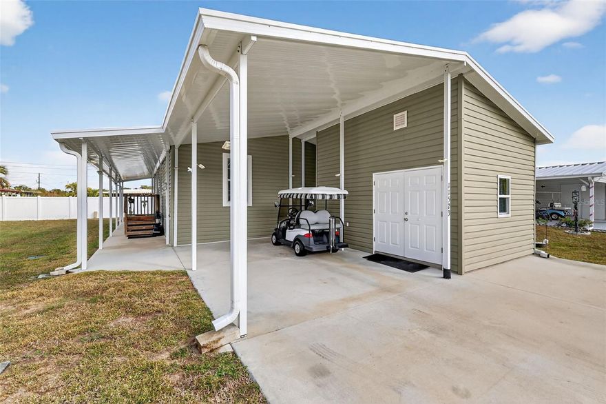 BEAUTIFUL FULLY FURNISHED HOME WITH BOAT SLIP!!! This is a must-see opportunity to own a 3-bedroom 2 bath home with access to Lake Yale! You own the land so NO LOT RENT! This home is only 4 years old and has an open floor plan with beautiful finishes throughout. There is a large storage/workshop with electricity. Large carport with high ceiling, and plenty of parking spaces. The interior of the home has been meticulously maintained and comes fully furnished, just bring your personal belongings and move right in! The home has a brand-new upgraded A/C unit (2025) as well as upgraded appliances. The golf cart with new batteries can also be negotiated!! The Lake Yale Estates Community has a quiet rural feel yet close to shopping, hospitals, and medical facilities. This great community has access to Lake Yale, a 4,000+ acre lake with incredible fishing and boating opportunities, boat slips, and community fishing pier. Other features of this community include a heated swimming pool, hot tub, RV/Boat storage, pool table, shuffleboard courts, fire pit and clubhouse with lots of scheduled activities. Your low monthly HOA includes lawn maintenance, trash, and RV/Boat storage. This is a golf cart friendly community, and the grounds are meticulously maintained with wide roads and underground utilities. There is also a beautiful sandy beach for you to sit and enjoy the sunset over Lake Yale or take your boat out for a sunset cruise! This home comes with a boat slip that has electricity making it easy to keep your boat ready for an excursion. You don't want to miss this lovely home. Call today to schedule your private showing. WELCOME HOME!