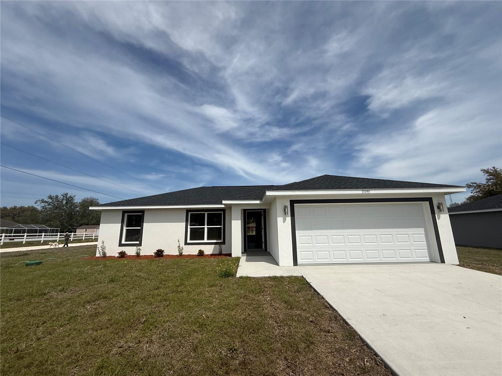For Rent – Brand New 3 Bedroom / 2 Bath Home in Rolling Ranch Estates
Be the first to live in this beautifully built Magnolia Model home, located in the peaceful community of Rolling Ranch Estates, just off Hwy 484. With easy access to Ocala, Dunnellon, Lake Otting, and Rainbow River, this home offers the perfect balance of quiet country living and nearby convenience.
This 3-bedroom, 2-bath home features an open-concept layout with vaulted ceilings in the main living areas and 8’ ceilings in the bedrooms. The spacious kitchen is equipped with elegant quartz countertops, soft-close wood shaker cabinets, and top-of-the-line stainless steel appliances (washer/dryer not included—hookups available).
Enjoy luxury vinyl plank flooring throughout, ceiling fans in all bedrooms, and designer lighting throughout the home. The master suite includes a spa-like bathroom with a tiled walk-in shower, double vanities, and a walk-in closet. Home is on well and septic, helping to reduce utility costs.
Lawn maintenance (grass cutting) is included in the rent, provided by the landlord.
Additional Details:
Brand new construction
Pet-friendly (breed and weight restrictions apply)
Washer/dryer hookups (tenants may bring their own units)
Quiet, undeveloped road for added privacy
Move-in ready upon completion
Appointments can be arranged for same-day showings—call for more information!