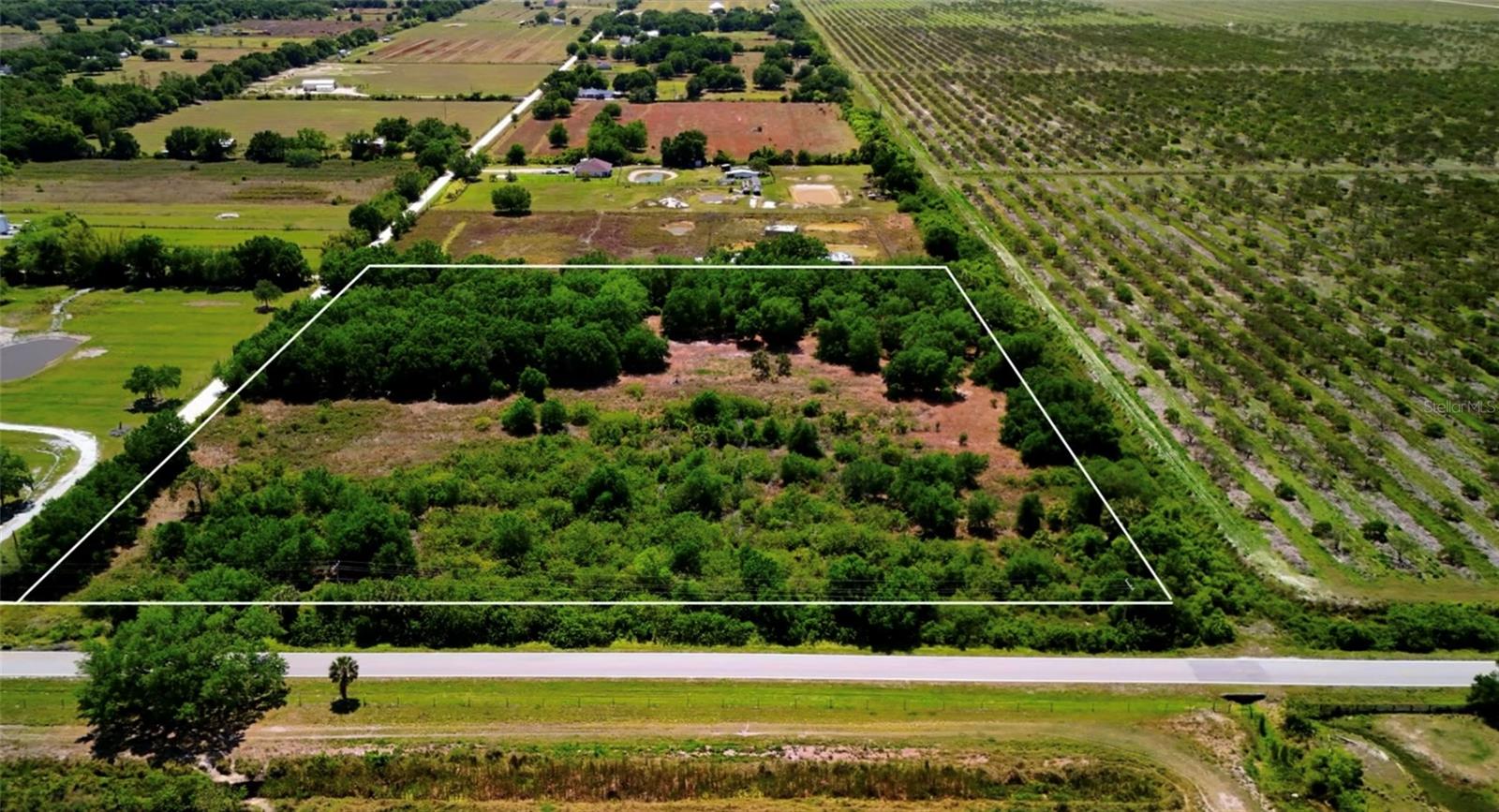 Experience the best of country living in DeSoto County (Arcadia), FL! This beautiful 10-acre property, once an orange grove, offers the perfect setting for your dream ranch or a thriving citrus operation. Your country estate can front northward on Pine Island Rd or to the east on SE English Ave. Surrounded by farms, ranches, and orchards, you'll enjoy the tranquility of rural life while being just 10 miles from Arcadia’s charming shops, restaurants, and renowned antique markets. Arcadia is home to exciting annual rodeos each fall, and outdoor enthusiasts will love the nearby Peace River for boating and fishing. Plus, you're just a short drive from Southwest Florida’s stunning Gulf beaches, including Sanibel Island, Boca Grande, Englewood, Venice, and Sarasota. Whether you're looking for a peaceful retreat or year-round tropical living, this property offers the best of both worlds!