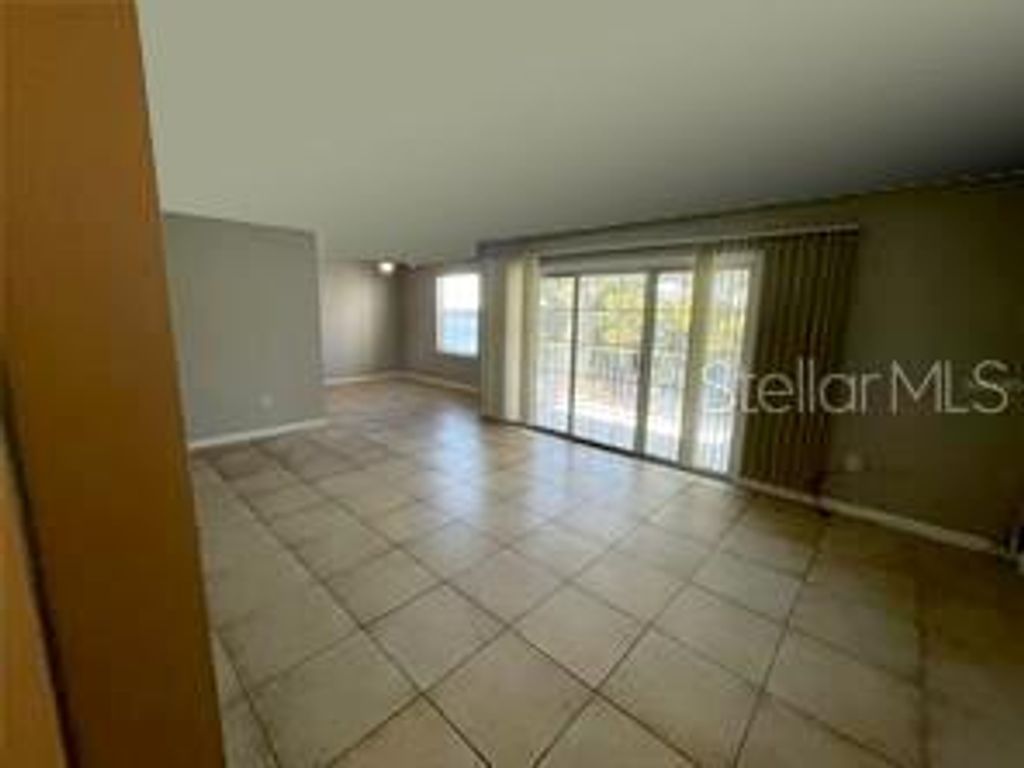 Photo of 4174 Versailles Drive #4174D, Orlando, FL 32808 (MLS # O6381440)