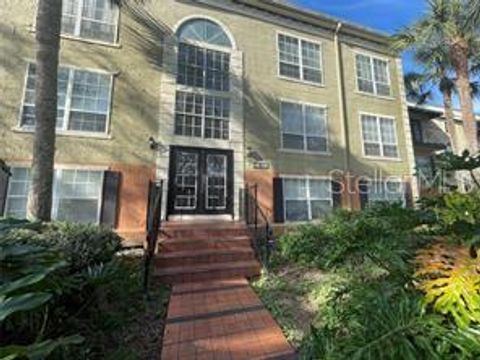 Photo of 4174 Versailles Drive #4174D, Orlando, FL 32808 (MLS # O6381440)