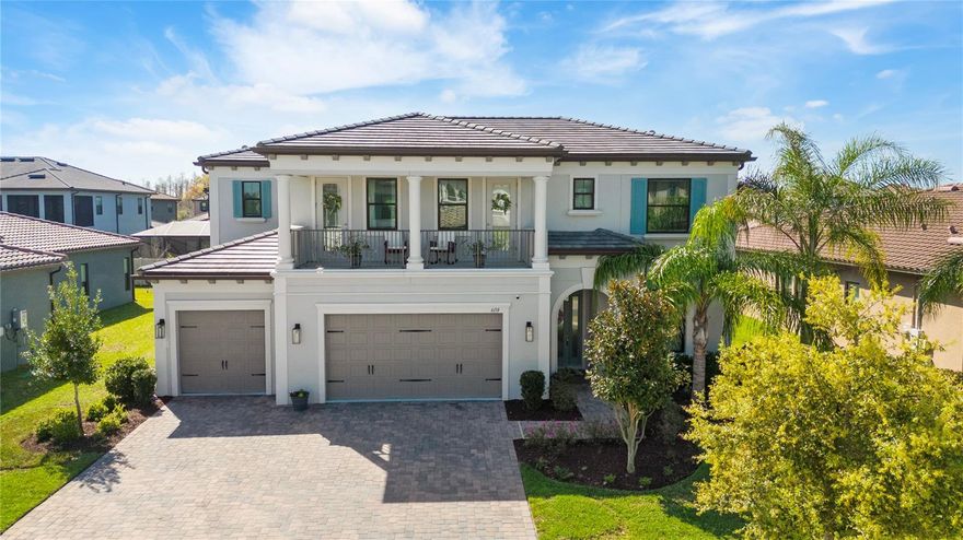 Located in Tarramor, a sought-after gated community in Odessa, this stunning Mediterranean-inspired residence showcases exceptional design and curb appeal with its arched entryway, clay tile roof and decorative window shutters. This spacious 5-bedroom, 3.5-bath home with a 3-car garage features a thoughtfully designed layout including a first-floor den/office, formal dining room and an elegant foyer entrance.
The open-concept living area is ideal for both everyday living and entertaining, highlighted by a large family room that flows seamlessly into the kitchen and casual dining nook. The chef’s kitchen features an oversized center island with single bowl apron sink, Quartz countertops, 42" Alpine cabinetry with soft-close drawers, custom backsplash, stacked cabinets with glass inserts, LED lighting package, crown molding and a walk-in pantry. Stainless steel appliances include a gas cooktop, built-in ovens, refrigerator and dishwasher. Beautiful wood-plank tile flooring enhances the main living areas.
The luxurious first-floor owner’s suite is privately positioned and offers a relaxing retreat, while the second floor features additional bedrooms along with a spacious loft and bonus room that opens to a private balcony.
Additional upscale features include tray ceilings, French doors, Silestone and granite bathroom countertops, 5-inch baseboards, and a large downstairs laundry room with sink. The exterior offers paver driveway and patio spaces perfect for enjoying Florida living.
Enhancing comfort and convenience, the home is equipped with a Vivint SmartHome Security System and a Kinetico full-home water softener and treatment center, delivering modern smart-home functionality and high-quality water throughout the entire residence.
This exceptional home offers the perfect combination of elegance, space and modern amenities within one of Odessa’s most desirable gated communities.