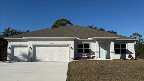 Photo of 3073 Jester Street, Port Charlotte, FL 33948 (MLS # C7499491)