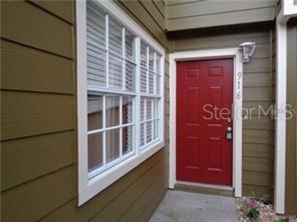 Photo of 916 Washington Palm Loop, Davenport, FL 33897 (MLS # O6335397)