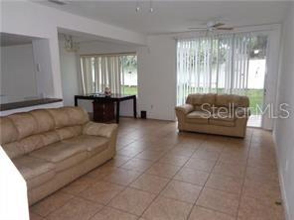 Photo of 916 Washington Palm Loop, Davenport, FL 33897 (MLS # O6335397)