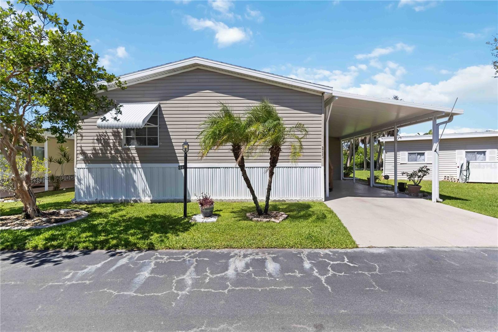Check out this well-maintained 3-bedroom, 2-bathroom manufactured home located in the highly sought-after waterfront community of Eagle Point. This TURN-KEY FURNISHED property is move-in ready and includes a PRIVATE BOAT DOCK directly behind the home, offering exceptional water access for boating and fishing enthusiasts. The community also features a private boat ramp, adding even more convenience for water lovers. With over 1,200 sq ft of living space, the home features vaulted ceilings, a spacious floor plan, and a large master suite complete with a walk-in closet, en suite bath with a walk-in shower, as well as a relaxing garden tub. Enjoy outdoor living on the wood deck at the back of the property, perfect for relaxing or entertaining while taking in peaceful canal views. Major updates include a NEW ROOF (2024) and NEW A/C UNIT (2023). The property sits high and dry and has never experienced flood damage, providing added peace of mind. Additional highlights include an attached aluminum carport and a large workshop, ideal for extra storage or hobbyists. Inside, you'll find a spacious interior laundry room complete with a washer and dryer and plenty of room for storage.
Eagle Point is a golf cart-friendly and deed-restricted 55+ community with low fees that cover water, sewer, trash, a priority on-site manager, maintenance of common areas, a community pool, and more. The community also features a welcoming clubhouse that regularly hosts fun events and activities—perfect if you're looking to enjoy some social time and connect with neighbors. This is the ideal blend of comfort, convenience, and lifestyle in a safe and friendly neighborhood.
Don’t miss this rare opportunity to own a waterfront home with direct boat access and incredible community amenities at a great price. Located in beautiful Punta Gorda, where you’ll find great restaurants and shopping nearby!