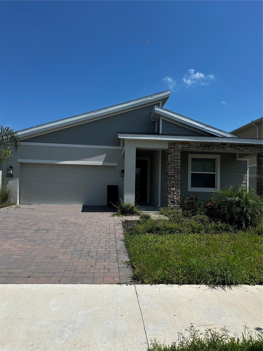 Beautiful and spacious 3-bedroom, 3-bathroom single-family home in the desirable Champions Pointe community, offering 2,076sq ft of comfortable living space. This partially furnished home features an open-concept layout with a modern kitchen, stainless steel appliances, granite countertops, and a bright living and dining area. The primary suite includes a walk-in closet and en-suite bathroom, while the additional bedrooms and baths provide plenty of space for family or guests. Located just steps away from the community pool situated right behind the home, perfect for enjoying sunny Florida days. The home also includes a two-car garage, washer/dryer, and central A/C. Conveniently close to top-rated schools, shopping, golf, and major highways. Available now – schedule your private tour today!