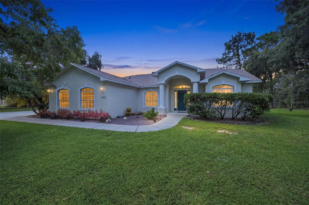 Photo of 16702 Lemans Drive, Spring Hill, FL 34610 (MLS # W7888671)