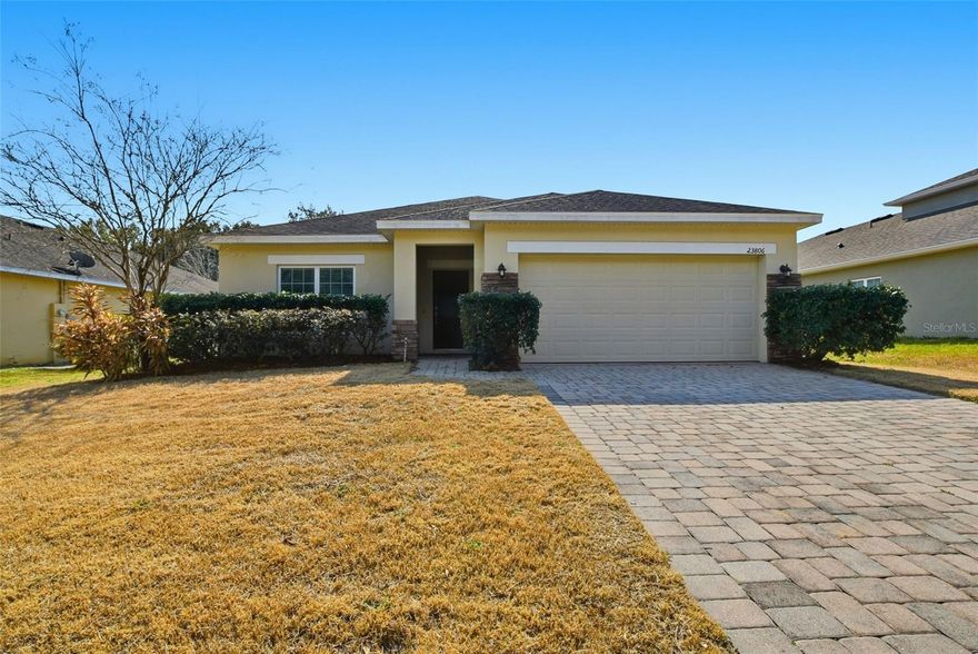 One or more photo(s) has been virtually staged. MOVE-IN READY and beautifully updated! This spacious 1-story home offers 4 bedrooms and 2 bathrooms with an open floor plan perfect for everyday living and entertaining. Enjoy a bright kitchen featuring a center island, pantry, accent lighting, and a new stainless steel refrigerator. Freshly painted interior including walls, doors, and trim adds a clean, modern touch. Complete with a 2-car garage—this home is ready for you to move right in!