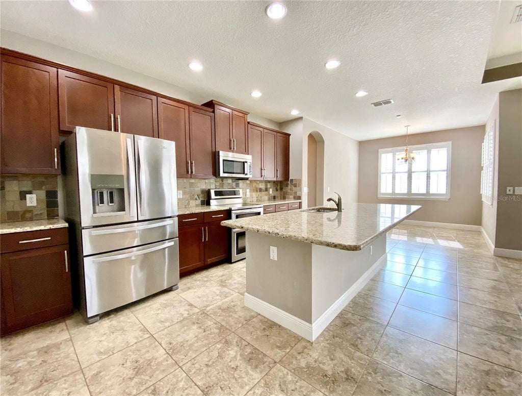 Photo of 12844 Woodmere Close Drive, Windermere, FL 34786 (MLS # O6451398)
