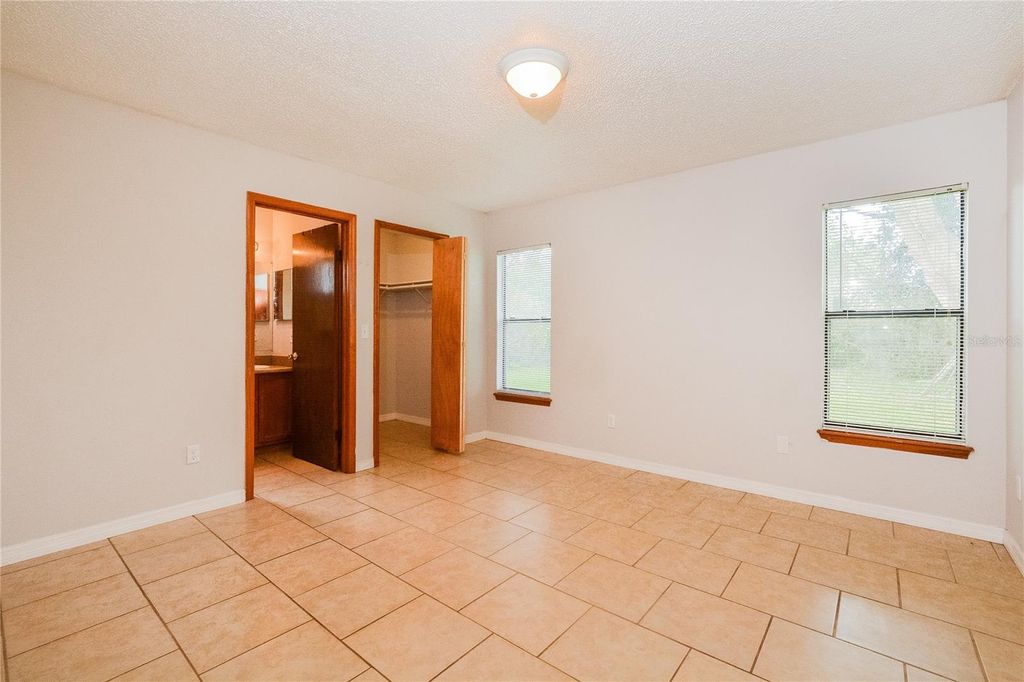 Photo of 3036 Beal Street, Deltona, FL 32738 (MLS # TB8440126)