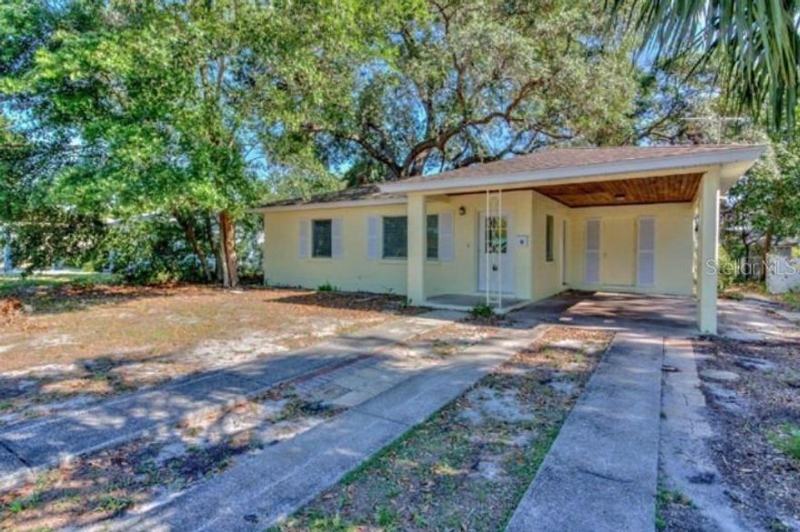 Check out this great central Lakeland home. !!  Large yard, carport and ready to move in today Make this great 2 bed 1 bath home yours! This beauty offers wood flooring throughout, washer dryer hookups, a beautiful shade tree with a fenced back yard and perfect home location. Minutes from Downtown Lakeland and Southeastern University.