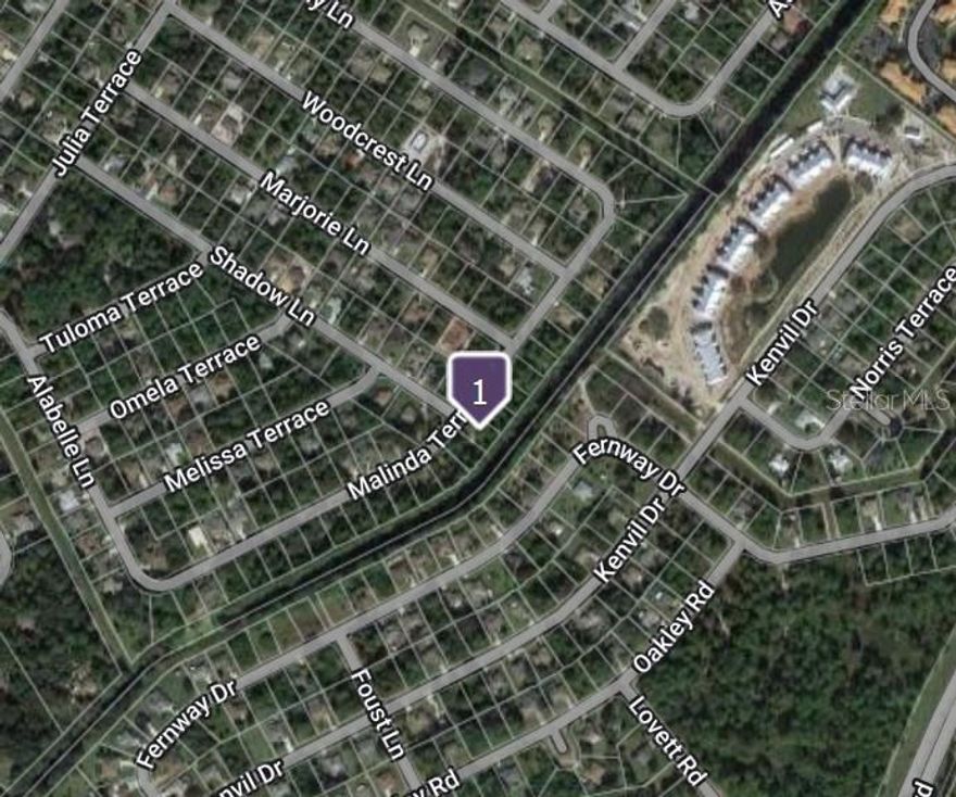 Freshwater canal lot, adjacent lot also available .