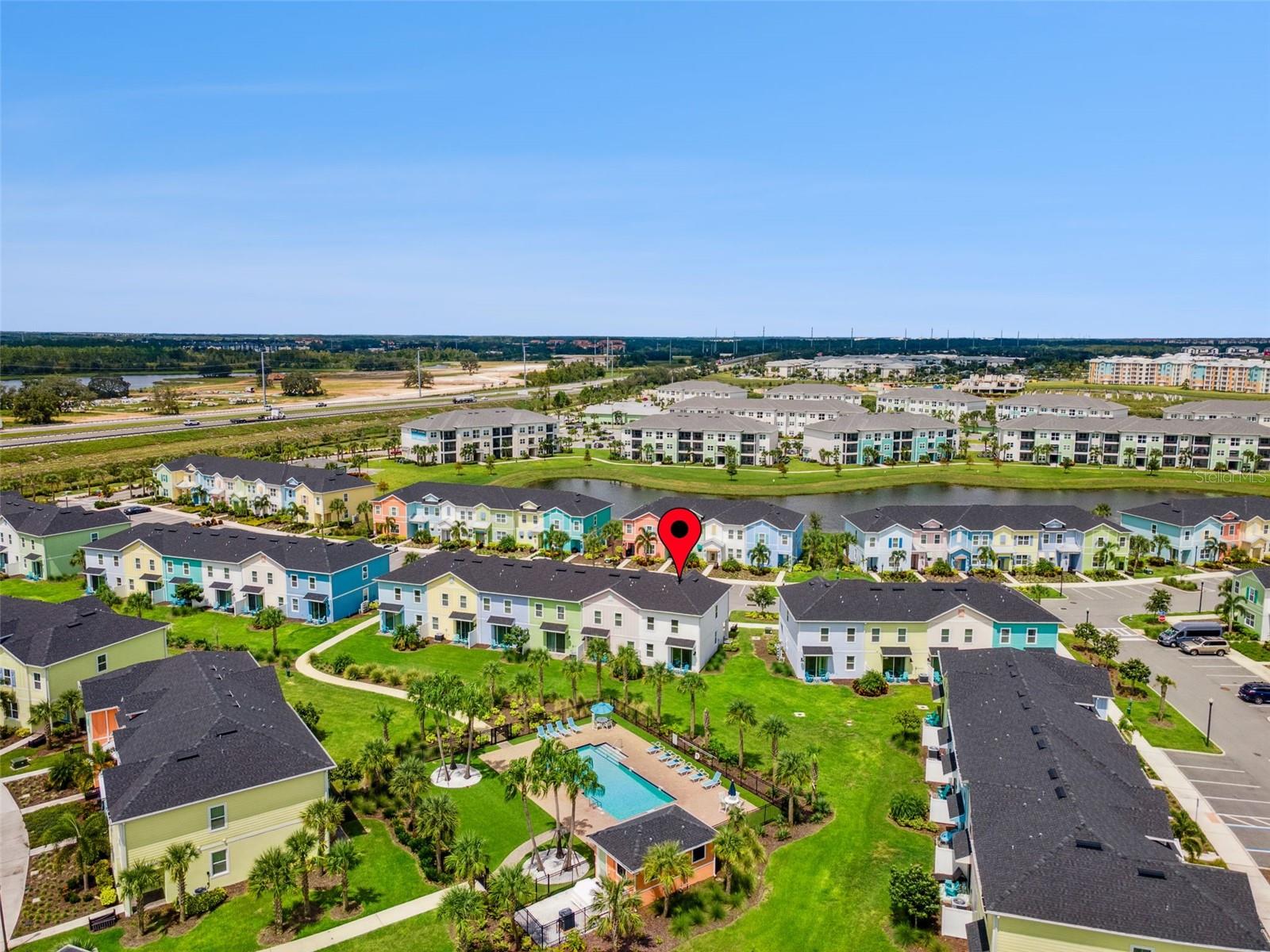 Escape to your own slice of paradise at 3136 Caribbean Soul Drive, a fully furnished 4-bed, 3-bath end-unit townhome nestled within the vibrant Margaritaville Resort Orlando. This property is a fantastic opportunity for both vacation home buyers and savvy investors, offering an unparalleled island-inspired lifestyle with the convenience of a world-class resort. The moment you step inside, you are greeted by an open floor plan and vibrant decor that truly embodies the Margaritaville spirit. The home is just steps away from one of the community pools, inviting you to spend your days relaxing in the sun or taking a refreshing dip. Every detail has been thoughtfully curated to provide a seamless vacation experience, making it an ideal choice for short-term rentals and personal getaways.
Beyond the front door, the Margaritaville Resort Orlando community provides a wealth of amenities that will keep you and your guests entertained. Enjoy complimentary shuttle service to Walt Disney World, and complimentary access to the Island H2O Live! Water Park, and unwind at the St. Somewhere Spa, or stay active at the Fins Up Fitness Center. The resort also boasts multiple dining options, including Euphoria Fish House and the Salty Rim Bar & Grill, as well as live music and entertainment. With its prime location close to Central Florida's world-famous theme parks, dining, and shopping, this property offers the perfect blend of resort-style living and easy access to all the excitement the area has to offer. Don't miss your chance to own a piece of this paradise!
