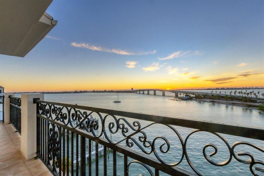 Welcome to penthouse #70 at Golden Bay on Golden Gate Point. Experience breathtaking sunsets over the John Ringling Bridge, Sarasota Bay, the Barrier Islands and beyond, setting the tone for an extraordinary lifestyle. An embodiment of luxurious downtown living, this exquisite penthouse showcases a blend of spaciousness and sophistication. Featuring three bedrooms, 3.5 baths and approximately 4,200 square feet of meticulously designed living space, it stands as a testament to unparalleled comfort and timeless elegance. Upon entry via the private elevator entrance, one is greeted by a meticulously crafted foyer adorned with tray ceilings, crown molding and tile flooring. Revealed through French doors, an impeccably designed office space merges functionality with refined style. The heart of this residence lies in its grand great room, boasting tray ceilings, a bar with seating and storage, glass cabinets, a beverage cooler and a granite countertop. Seamlessly connecting indoor and outdoor spaces, an enormous balcony expands across the kitchen and great room. The wall of sliders is complete with remote shades, offering breathtaking views or tranquil shade when needed. A culinary haven awaits in the expansive kitchen, showcasing abundant white cabinetry, top-tier stainless steel appliances including a Viking induction range and Sub-Zero refrigerator, glass cabinets, an island with a prep sink and an inviting dining area. The primary bedroom epitomizes luxury, featuring a tray ceiling, a sprawling walk-in closet with custom organization and a balcony presenting sweeping views of Harts Landing, the iconic John Ringling Causeway, Lido Key and the Gulf of Mexico beyond. The en-suite primary bath boasts a luxurious tub, dual vanities, a glass shower and a water closet. This remarkable penthouse goes above and beyond, offering a fitness room with mirrored walls and a balcony, a movie theatre with a large screen, a beverage cooler and an audio-visual system. Practicality is evident with a well-equipped laundry room and multiple storage closets catering to everyday needs. Beyond its luxurious interiors, this residence offers private access to a rooftop deck directly from the great room, a captivating escape to revel in panoramic views of Golden Gate Point and Sarasota's stunning coastal scenery. Residents of Golden Bay enjoy exclusive amenities, including a waterfront pool and a day dock, ideally complementing the serene waterfront lifestyle. On the desired Golden Gate Point, this location harmoniously blends peaceful exclusivity with effortless proximity to downtown Sarasota's vibrant cultural, shopping and dining destinations. Just minutes from St. Armands Circle and pristine beaches of Lido and Longboat Key, this waterfront gem offers the ultimate in luxury and convenience.