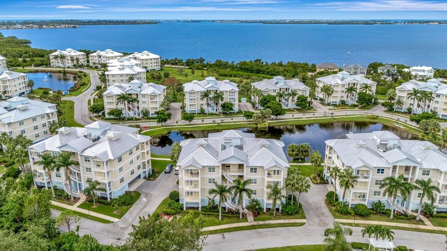 Welcome to a rare opportunity to live in Palma Sola Bay Club, a luxury gated community offering the very best of Florida coastal living. If you have been reaming of a maintenance-free lifestyle just minutes from Anna Maria Island's world-famous beaches, this stunning top floor condo with direct partial Bay view is the one for you. Step inside and you'll immediately notice the solid 9-foot wood doors and the open, light-filled floor plan. The living room features beautiful custom wainscoting that elevated the space with a designer touch.  From here, step out the balcony to enjoy a partial Bay view and breathtaking sunsets, with the soothing sound of the lake fountain right outside-the perfect spot to start your day with a cup of coffee or wind down in the evening. The open floor plan is filled with natural light and features ceramic tile throughout-no carpets, a favorite for buyers who value both style and allergy-friendly living. The kitchen is a showstopper, thoughtfully designed with stainless steel appliances, including a newer refrigerator (2022). Elegant shelf paper-lined cabinets add a fresh, clean look, while pull-out shelving, soft-close hinges, granite countertops, under-cabinet lighting ,and a stylish backsplash combine beauty with function. The primary suite is truly a retreat. French doors open to a second private balcony, while the spa-like bathroom includes dual sinks, a soaking garden tub, and an expansive walk-in closet. Adding even more practically, the bedroom has built-in shelves-a detail every homeowners appreciates for keeping personal items beautifully organized and easy to find. Two additional bedrooms provide comfort for guests or family, each equipped with ceiling fans, while the laundry room offers practical luxury with a wash basin, storage cabinets, and a granite folding countertop. A brand new AC unit provides peace of mind and efficient cooling year-round and updated window coverings with blinds and elegant drapes complete the modern, move in ready feel. Living in Palma Sola Bay Club means enjoying resort style amenities every day. The heated community pool and outdoor grilling pavilions are perfect for entertaining. A putting green, fitness center, and elegant clubhouse have activities for every lifestyle. For water lovers, the community provides an observation deck, a kayak storage, making it easy to enjoy morning paddles or sunset adventures. Two covered parking spaces under the building, with elevator access straight to your top floor unit, ensure convenience and comfort. Beyond the gates, the location couldn't be better. Just seven minutes to the pristine beaches of Anna Maria Island and only minutes from the world -renowned IMG Academy, this condo is ideal for families, athletes, or investors. Fine dining, shopping, cultural attractions, and all the best of Bradenton and Sarasota are right at your fingertips. This is more than a home- its a lifestyle. Carefree living,  stunning Bay views, and a unbeatable location make this condo a true gem. If you are ready to embrace year-round vacation living by the water, this is your chance.  Seller will include partial furniture, as well as all bedding, linens, and kitchen utensils with the sale of the property. Schedule your private showing today-your Bay View dream condo is waiting for you!