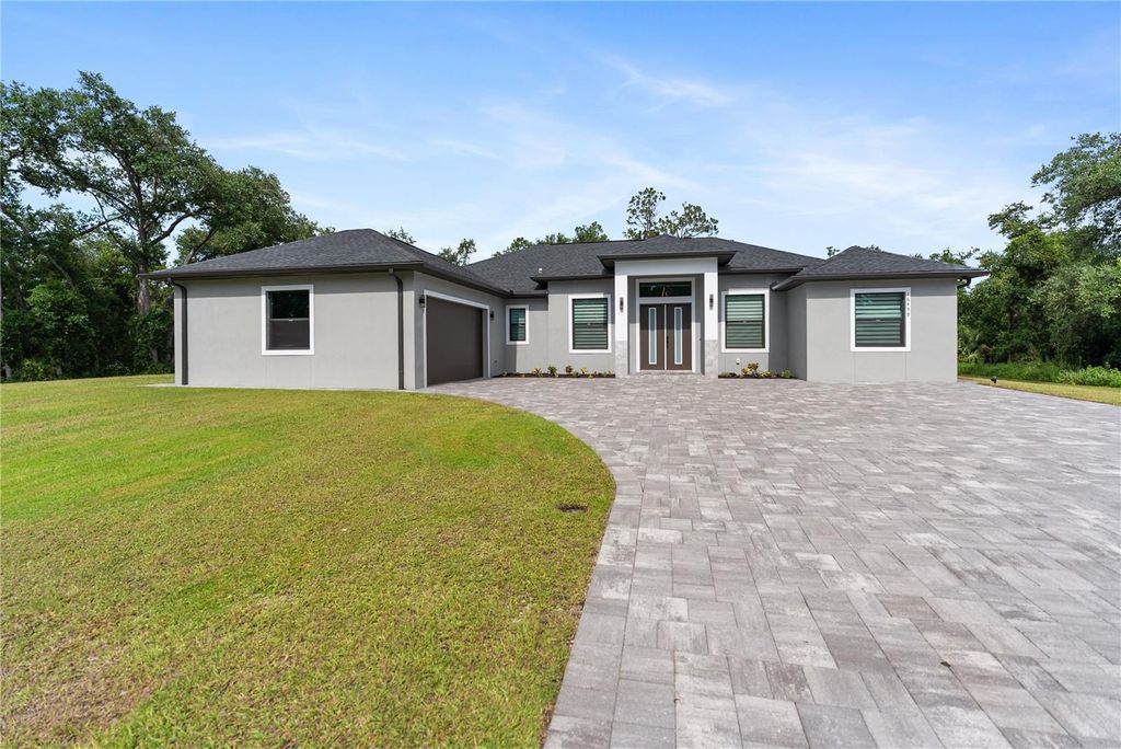 Photo of 16451 Chamberlain Boulevard, Port Charlotte, FL 33954 (MLS # A4660886)