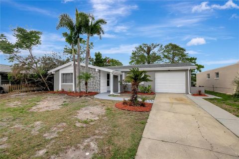 Photo of 4111 Stratfield Drive, New Port Richey, FL 34652 (MLS # TB8366213) Photo of 4111 Stratfield Drive, New Port Richey, FL 34652 (MLS # TB8366213)