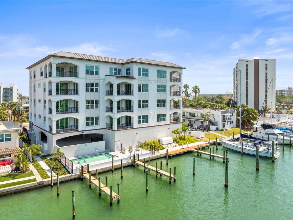 Photo of 211 Dolphin Point #5, Clearwater Beach, FL 33767 (MLS # TB8419430)