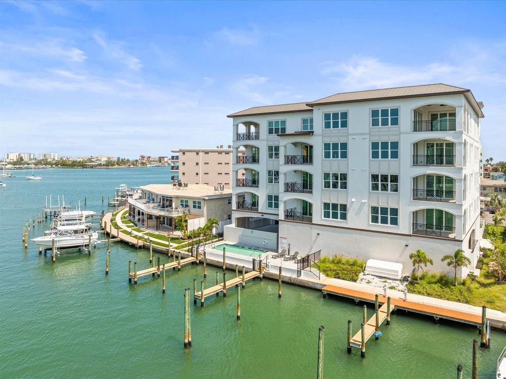 Photo of 211 Dolphin Point #5, Clearwater Beach, FL 33767 (MLS # TB8419430)