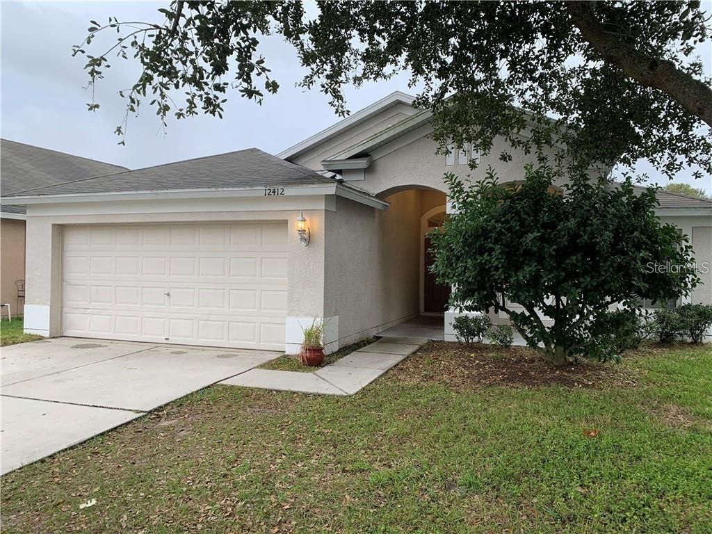 Photo of 12412 Cedarfield Drive, Riverview, FL 33579 (MLS # TB8486522)