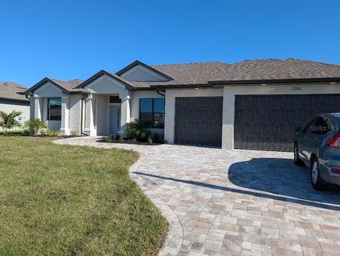 Photo of 254 White Marsh Lane, Rotonda West, FL 33947 (MLS # D6141385)