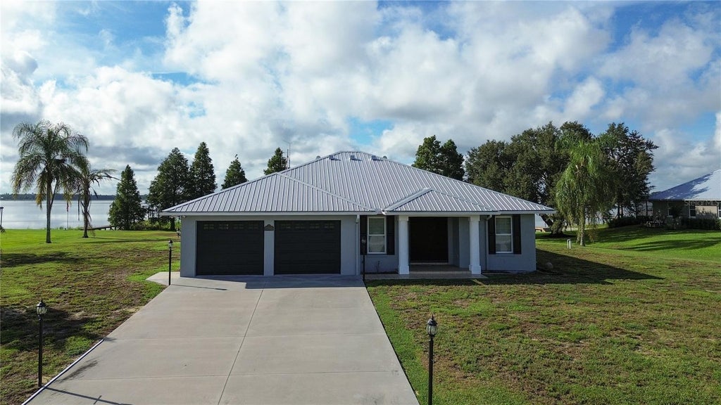 Photo of 7884 N Lake Buffum Shores Road, Fort Meade, FL 33841 (MLS # L4964746)