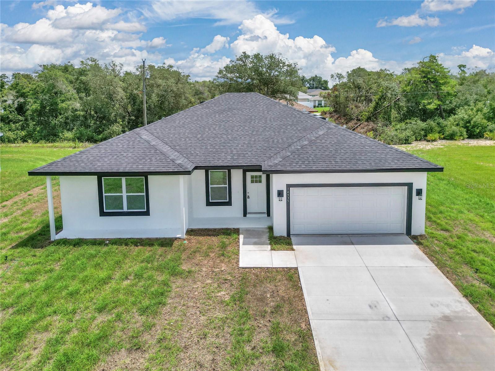Beautiful New Construction Home on a Quiet Street in Ocala, FL
This spacious 4-bedroom, 2.5-bath home offers 2,466 total square feet, including 1,816 heated living space.
The kitchen features plenty of cabinet space, a large island, and all stainless steel appliances.
The master bathroom includes many upgrades, such as double sinks, a relaxing tub, and a spacious shower.
Enjoy privacy and your dream Florida lifestyle on the lanai — perfect for BBQs and outdoor gatherings.
Additional features include a double-car garage and driveway. Washer and dryer will be installed prior to move-in.
Located on a calm street ideal for families, just minutes from I-75 and all that Ocala has to offer.