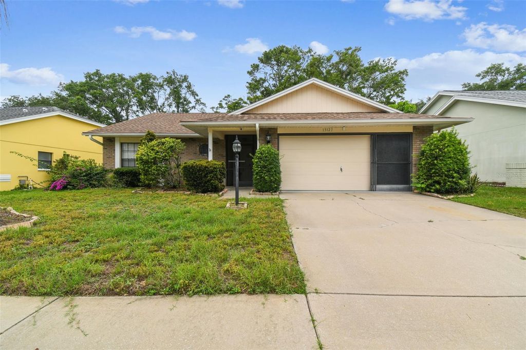 Photo of 13127 Topflite Court, Hudson, FL 34669 (MLS # TB8393326)