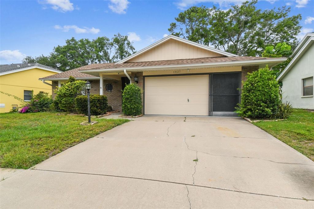 Photo of 13127 Topflite Court, Hudson, FL 34669 (MLS # TB8393326)