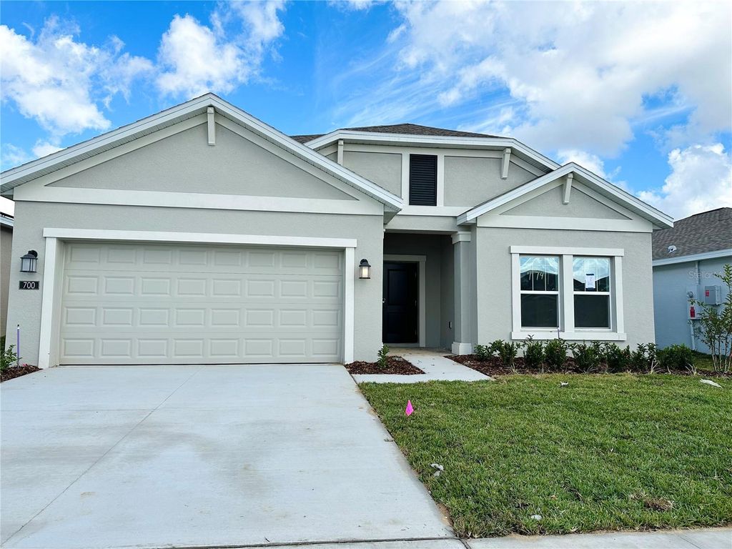 Photo of 700 Daring Drive, Davenport, FL 33837 (MLS # O6400437)